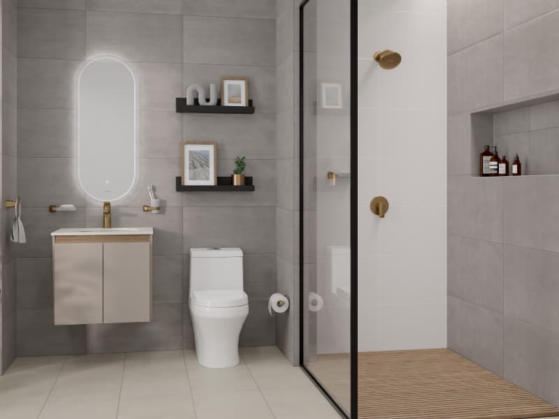 Baño moderno en tonos grises y dorados