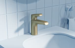 Grifería para lavamanos dorada